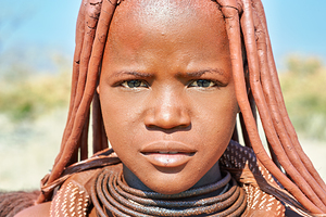 Portrait of a Himba woman from Kunene region in Namibia
