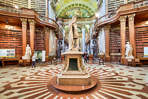 Magnificent baroque library interior with statues books and vi