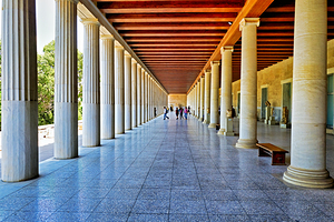 Visitors walking through the Stoa of Attalos in Athens Greece