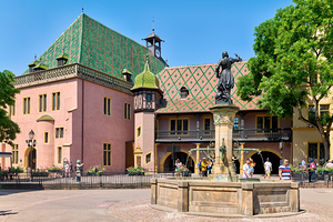 Visitors explore the square at Koifhus in Colmar Alsace France