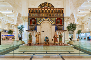 Ornate Middle Eastern decor with music and clock in Dubai by Marco Brivio