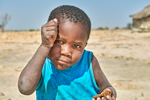 Joyful boy in Kavango Region playing in Namibia