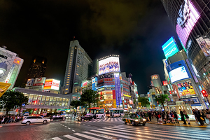 Shibuya Tokyo: vibrant night lights and bustling traffic