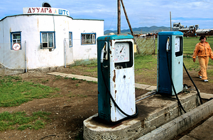 Vintage petrol station in Mongolia with old pumps by Marco Brivio