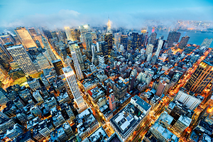 Aerial view shows Manhattan skyline with buildings and streets