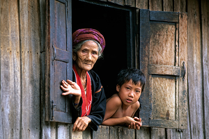 Life in Kalaw village with an elder and a child at the window