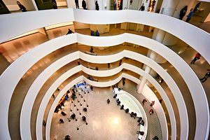 Visitors explore the Guggenheim Museum in New York City