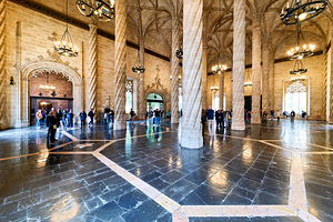 Visitors explore Lonja de la Seda in Valencia Spain