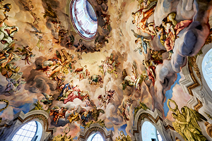 Stunning Baroque ceiling fresco of angels and religious figures.