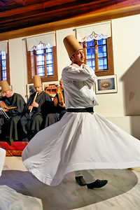 Whirling dervishes perform in Istanbul during a sufi ceremony