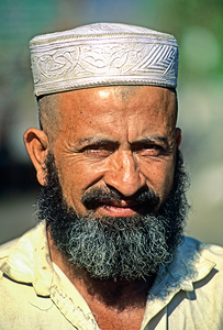Portrait of a bearded man in Pakistan during daylight