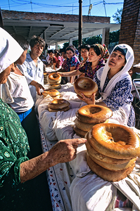 People selling bread at a market in Khiva Uzbekistan