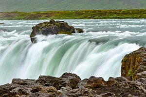 Explore Godafoss waterfall in Iceland during a cloudy day