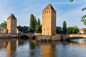 Exploring covered bridges in Strasbourg on a clear day