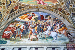 Visitors view Raphael frescoes in the Vatican Museums in Rome