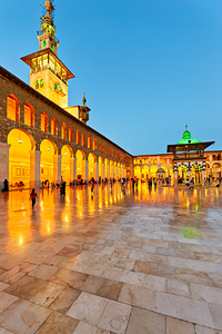 Visitors gather at Umayyad Mosque in Damascus during evening hou
