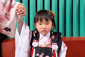 Child in traditional dress in Asakusa Tokyo during a cultural o