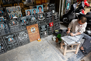 Craftsman making stone engravings in Hanoi Vietnam by Marco Brivio