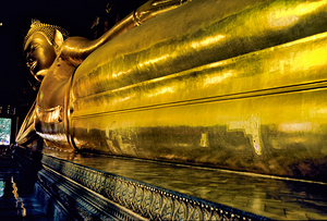 Giant Buddha statue inside Wat Pho temple in Bangkok Thailand