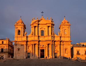 Noto Cathedral stands tall during sunset in Noto Sicily