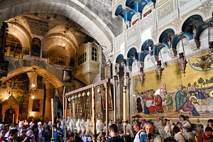 Visitors explore the church of the Holy Sepulchre in Jerusalem