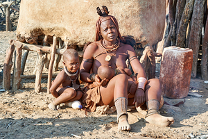 Mother and son in Himba village in Kunene Region of Namibia