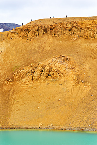 Visitors exploring the Krafla caldera in Iceland