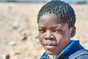 Children play in Palmwag Kunene Region Damaraland on a sunny day