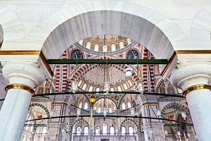 Visitors observe the interior of Fatih Mosque in Istanbul