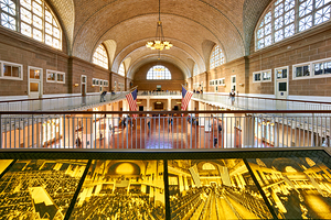 Visitors at Ellis Island exploring history of immigration