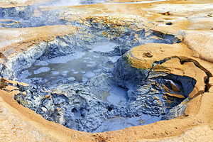 Explore hverir hot springs in Iceland with bubbling mud pools