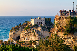 Tourists view Santa Maria dellIsola Monastery in Tropea Calabri