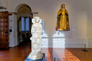 Visitors admire artwork in Museo Nazionale del Bargello Florence