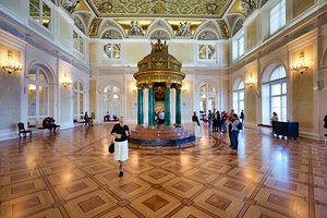 Visitors explore the Winter Palace in St. Petersburg Russia