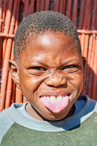 Joyful child shows playful expression in Kavango Region Namibia