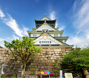 Osaka Castle in Japan under a clear sky on a sunny day