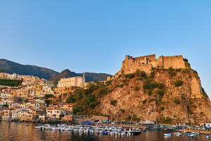 Sunrise over Chianalea village and Ruffo castle in Calabria