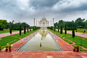 Visit to Taj Mahal Palace in Agra India with cloudy skies