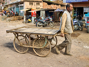 Man pulls an empty cart in Orchha Madhya Pradesh India