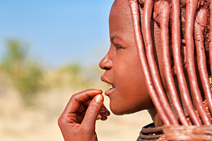 Portrait of a Himba woman in Namibia at daytime