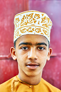 Boy in traditional dress in Muscat Oman during daytime