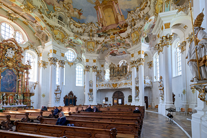 Pilgrimage church of Wies inside with visitors in Bavaria German