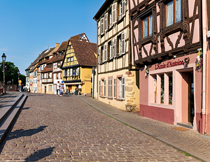 Visitors stroll along cobblestone street in Petite Venise Colmar