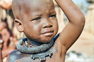 Child in himba village in kunene region namibia