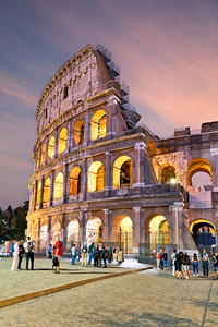 Exploring the Colosseum at dusk in Rome Italy