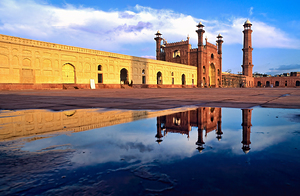 Badshahi Mosque reflects in water at Lahore Pakistan