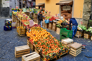 Greengrocer selling fruits and vegetables in Naples Campania Ita