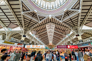 Visitors explore stalls in Central Market of Valencia Spain