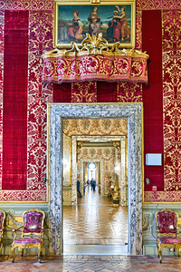 Art gallery in palazzo Doria Pamphilj in Rome with red walls