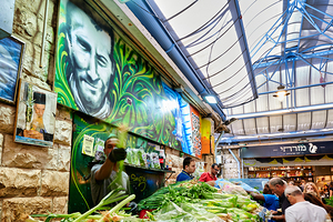 Vendors and fresh produce at Mahane Yehuda Market in Jerusalem